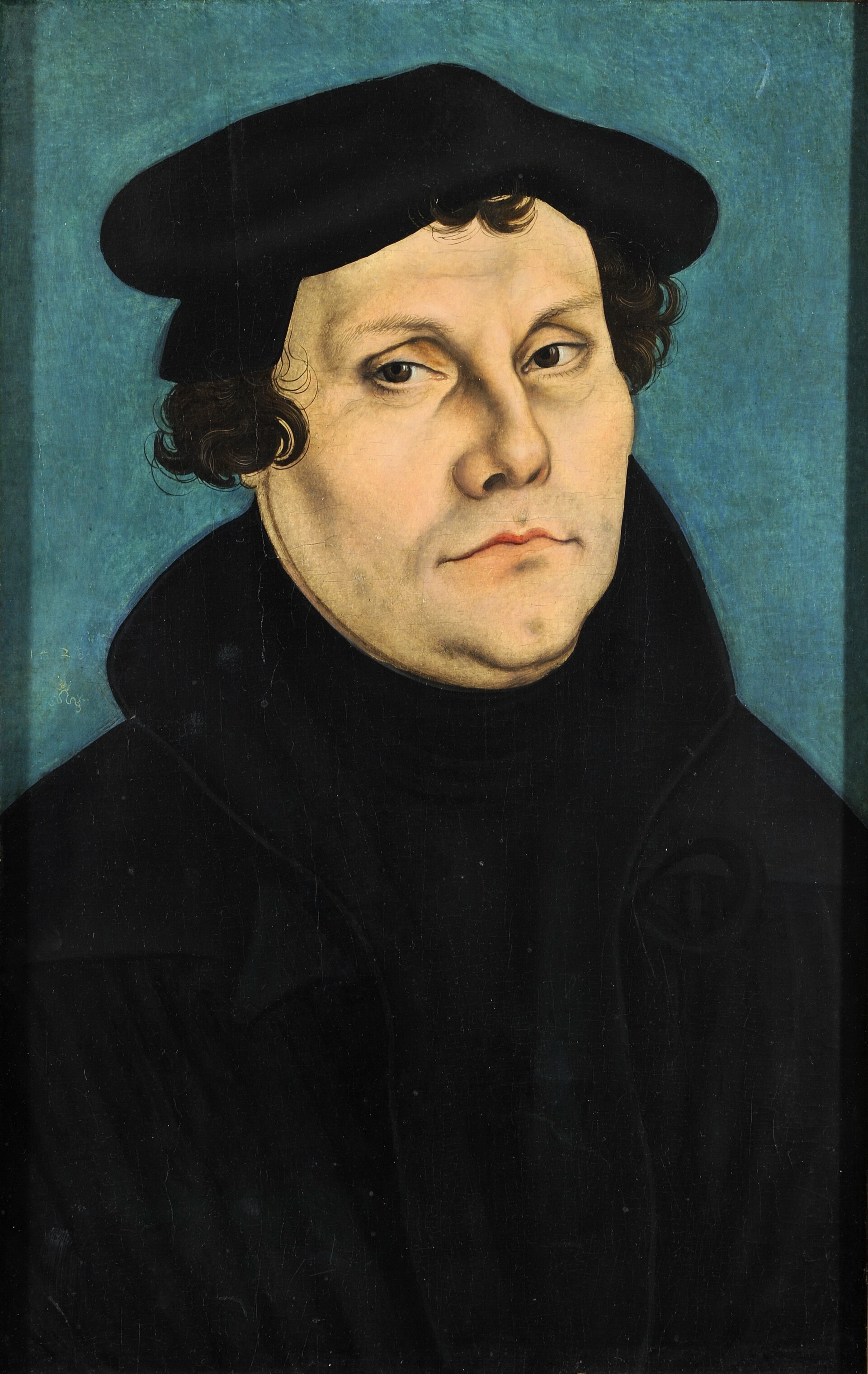 Painted half-length portrait of a broad-faced man in a black gown and black cap, his hands folded, against a plain light background