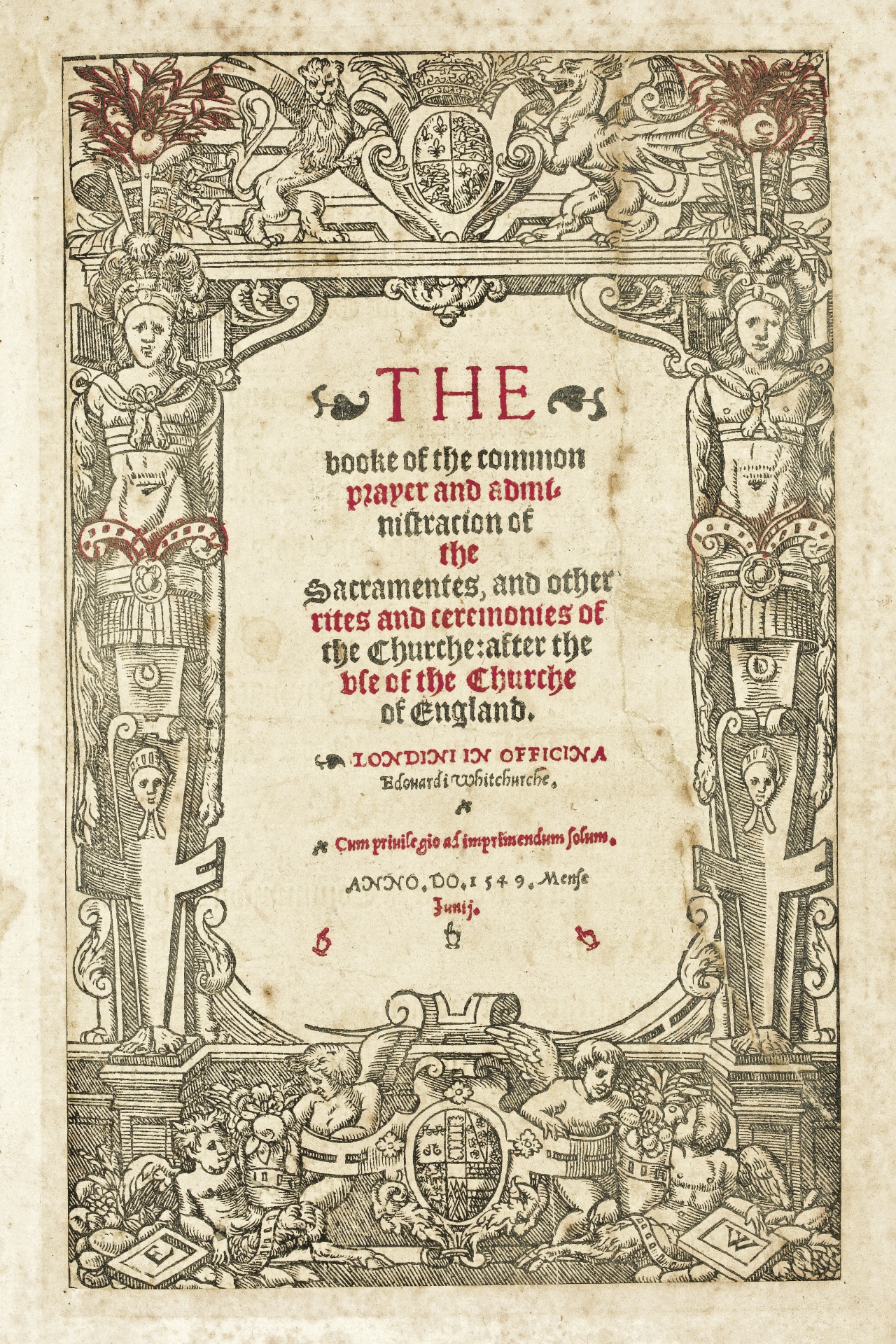 Printed title page in black letter type, with the title The booke of the common prayer inside a decorative woodcut border