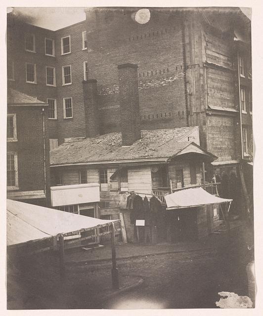 Mid-nineteenth-century photograph of an old brick house near Little Dock Creek in Philadelphia