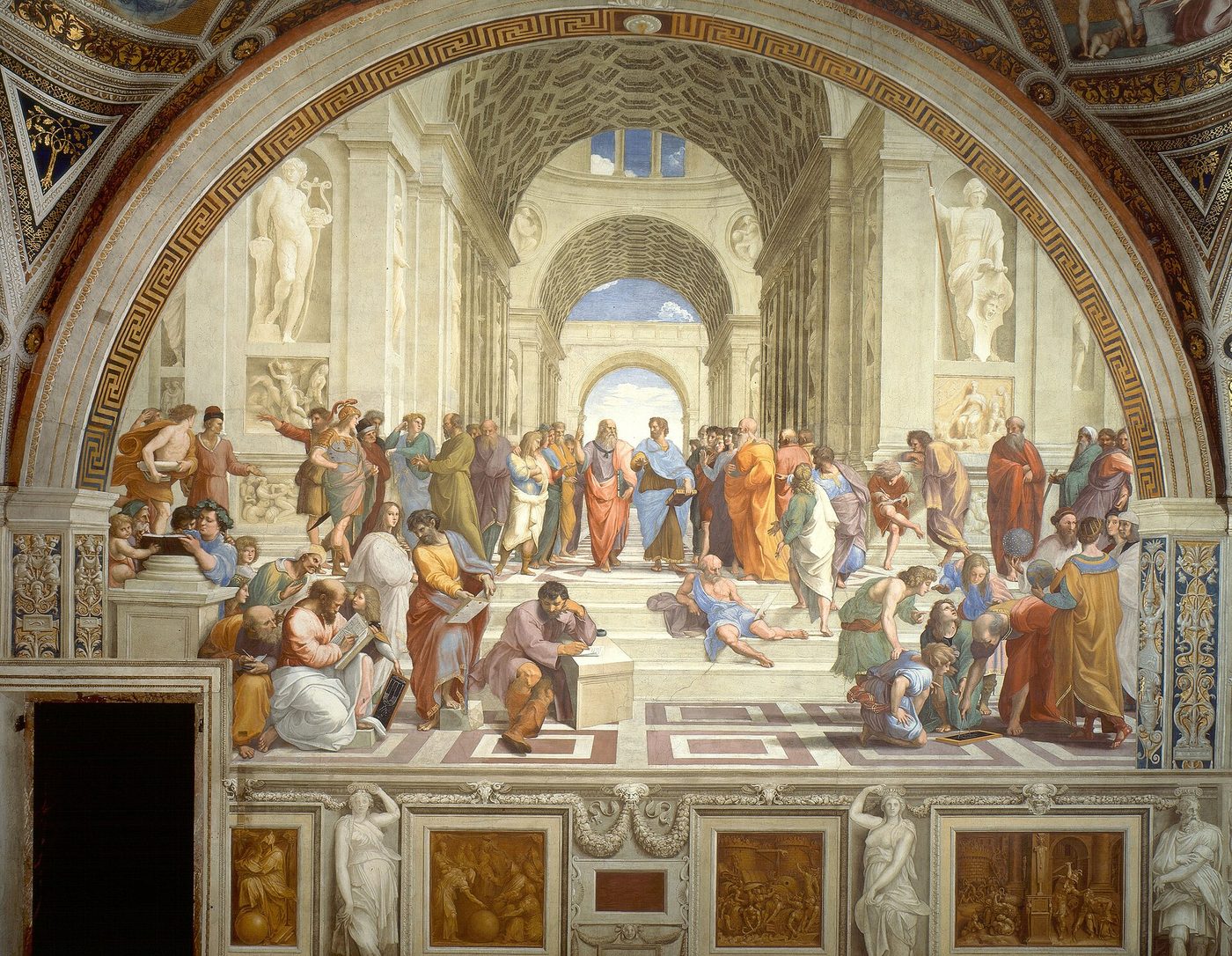 A crowded painted hall of philosophers, with Plato pointing upward and Aristotle holding his hand out flat at the center