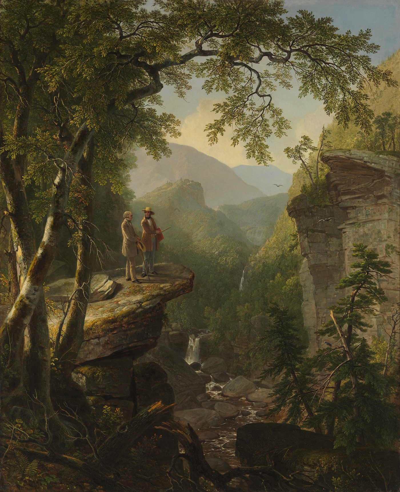 Tall painting of two men in dark coats standing on a rock ledge above a deep wooded gorge with a waterfall, framed by overhanging trees