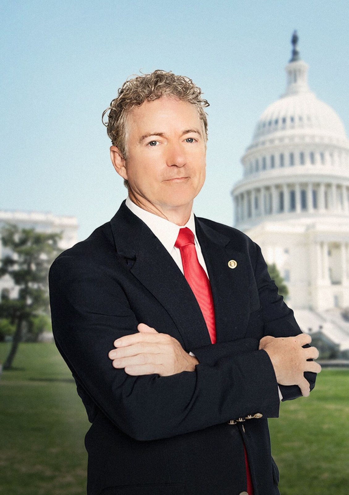 Official 2025 Senate portrait of Rand Paul, gray-haired, in a dark suit and blue tie