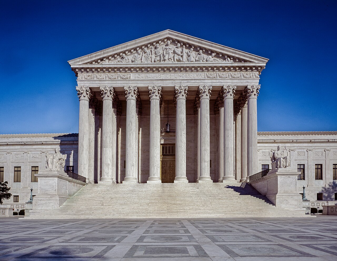 The west front of the United States Supreme Court building in Washington, a white marble temple with tall columns and wide steps