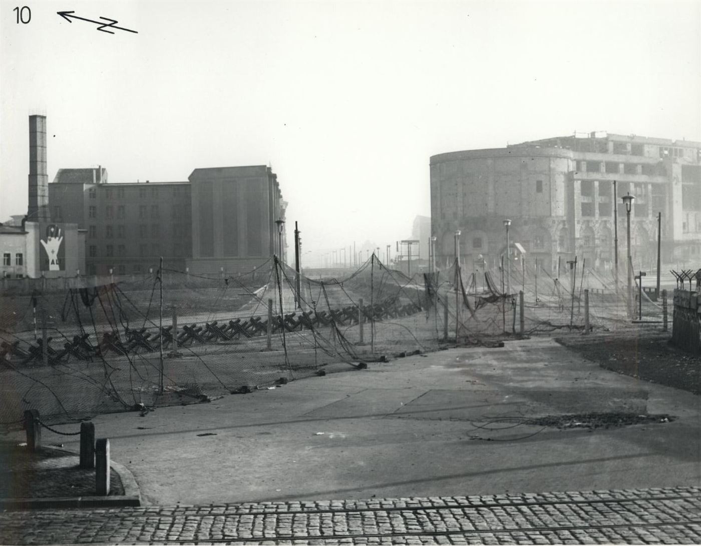 Concrete wall and barbed wire across Potsdamer Platz in Berlin, November 1961