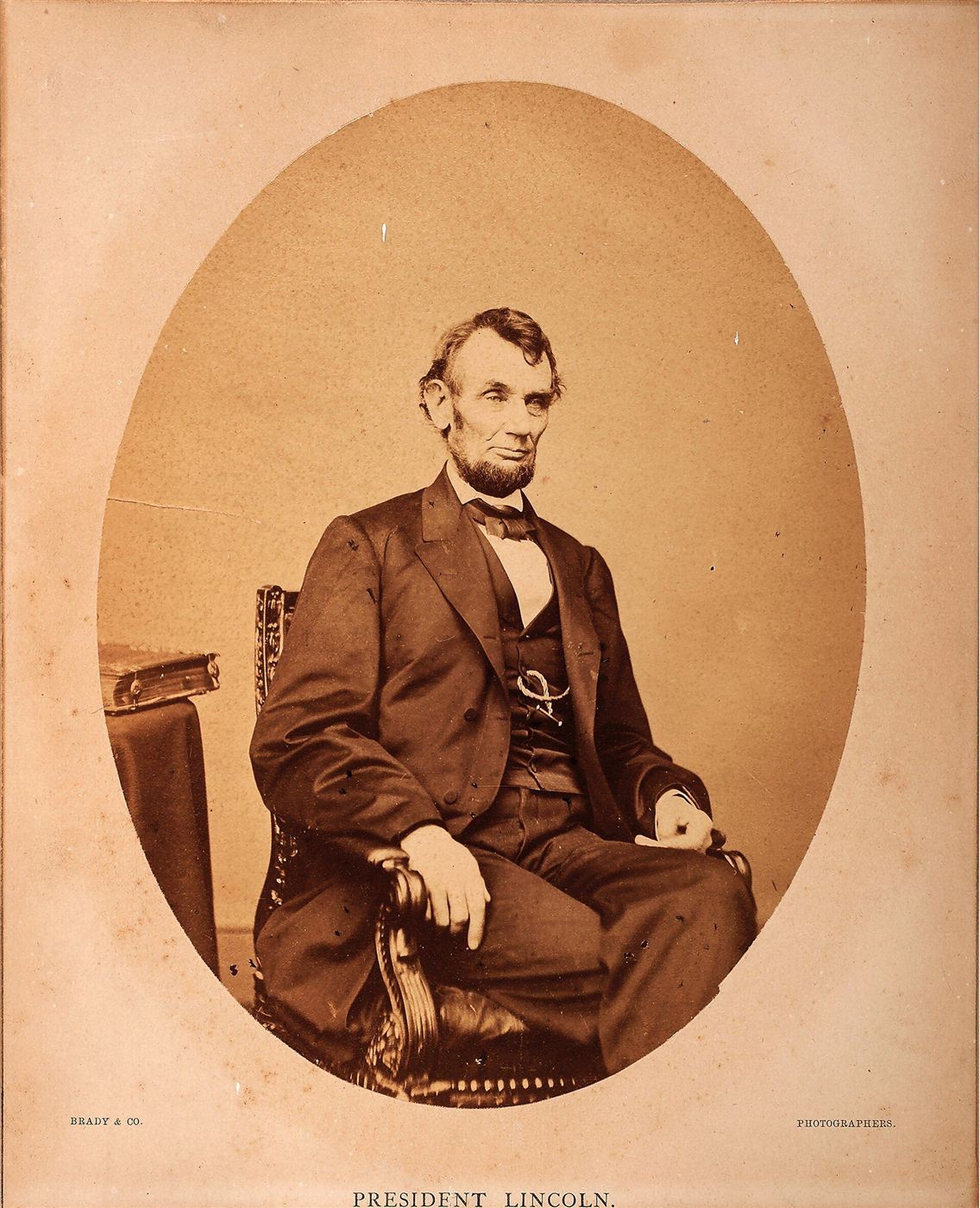 Abraham Lincoln seated, photographed by Mathew Brady in February 1864
